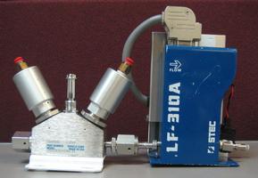 https://www.keySurplus.com/clientresources/65489/65493/03/92603/136391-a-O111-STEC-Liquid-Flow-Controller-w-Pneumatic-3-Way-Valve.jpg